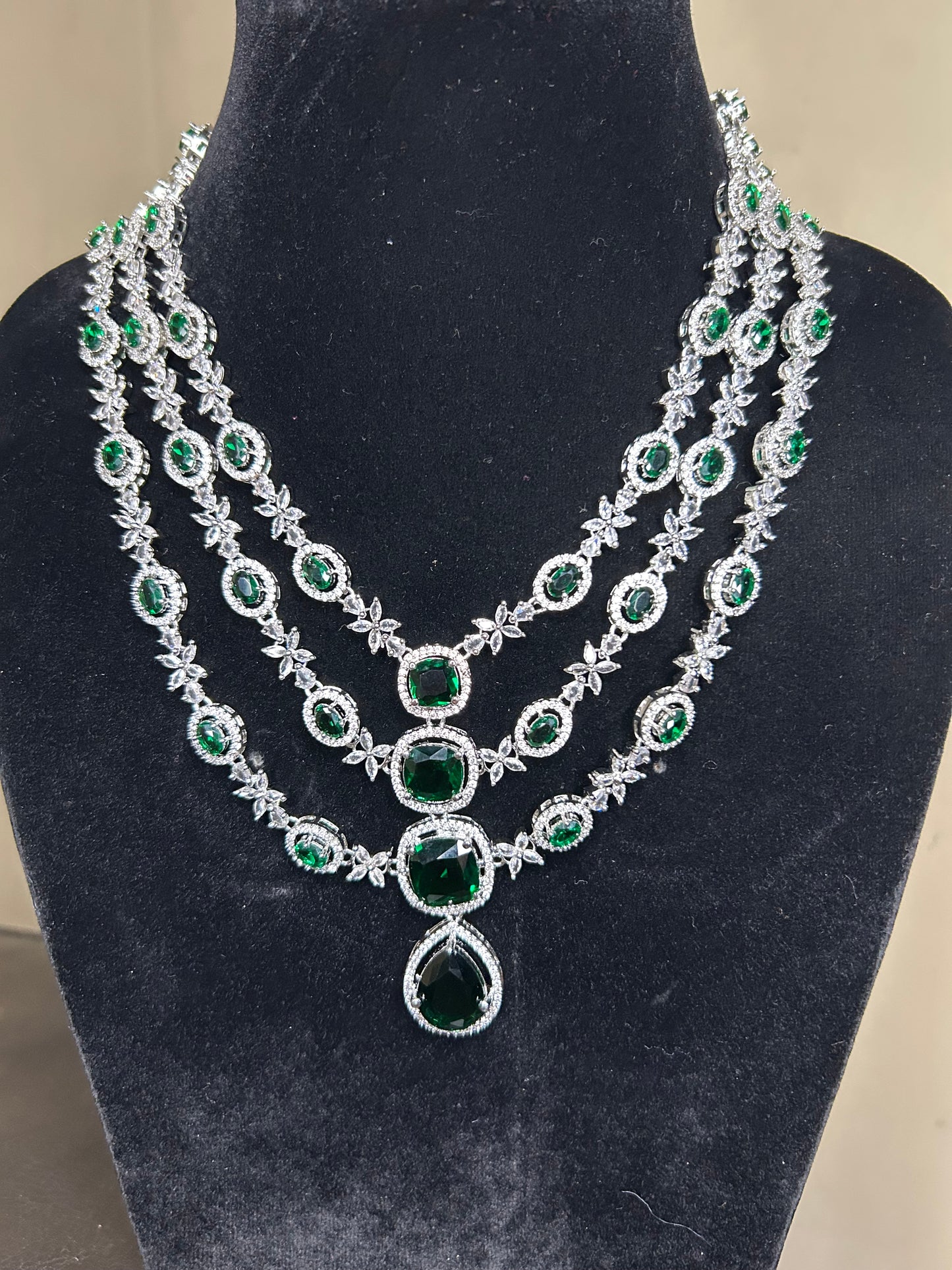 Ad layered in green and ruby
